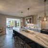 Open plan living Kitchen to dining Villa Olivo Photo credit Davide Bischeri.
