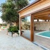 Trulli-of-Stars-indoor-outdoor-veranda-with-pool