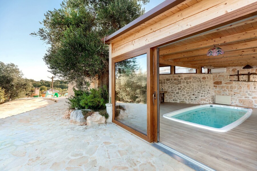 Trulli-of-Stars-indoor-outdoor-veranda-with-pool