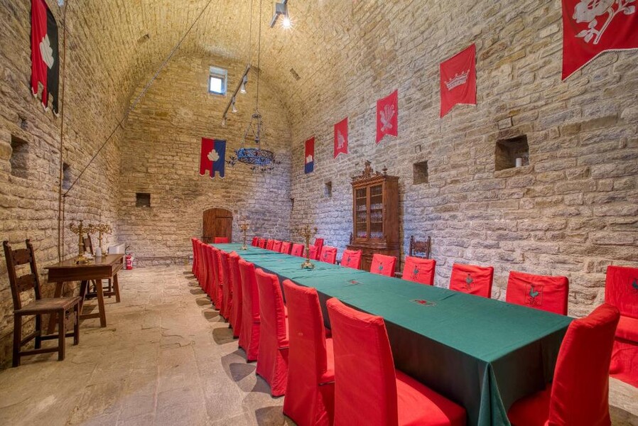 Medieval dining hall in Castello dei Bonaparte in Umbria