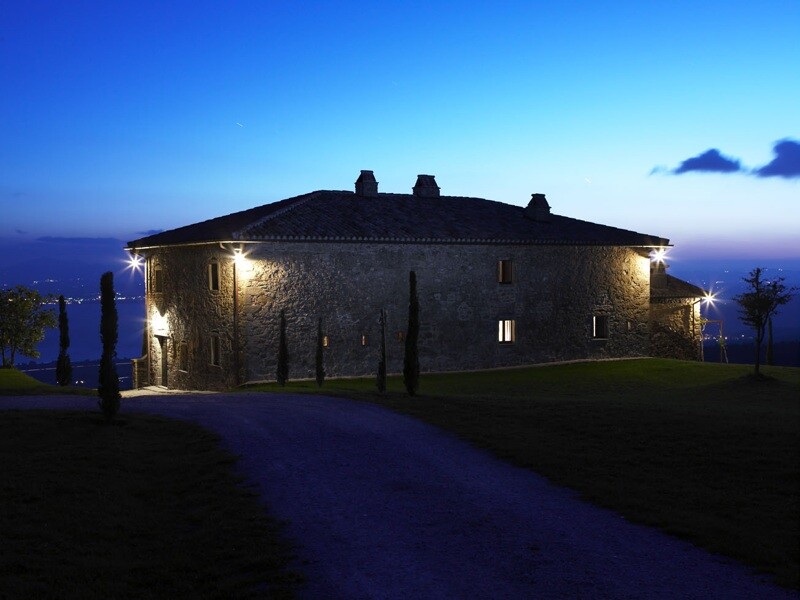 Casa Bramasole by night with view over the Trasimeno Lake